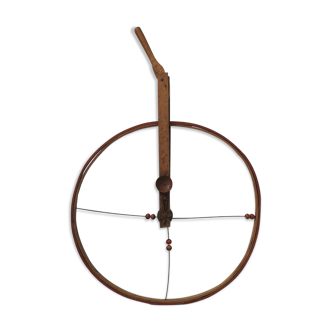 Old musical wooden hoop to roll