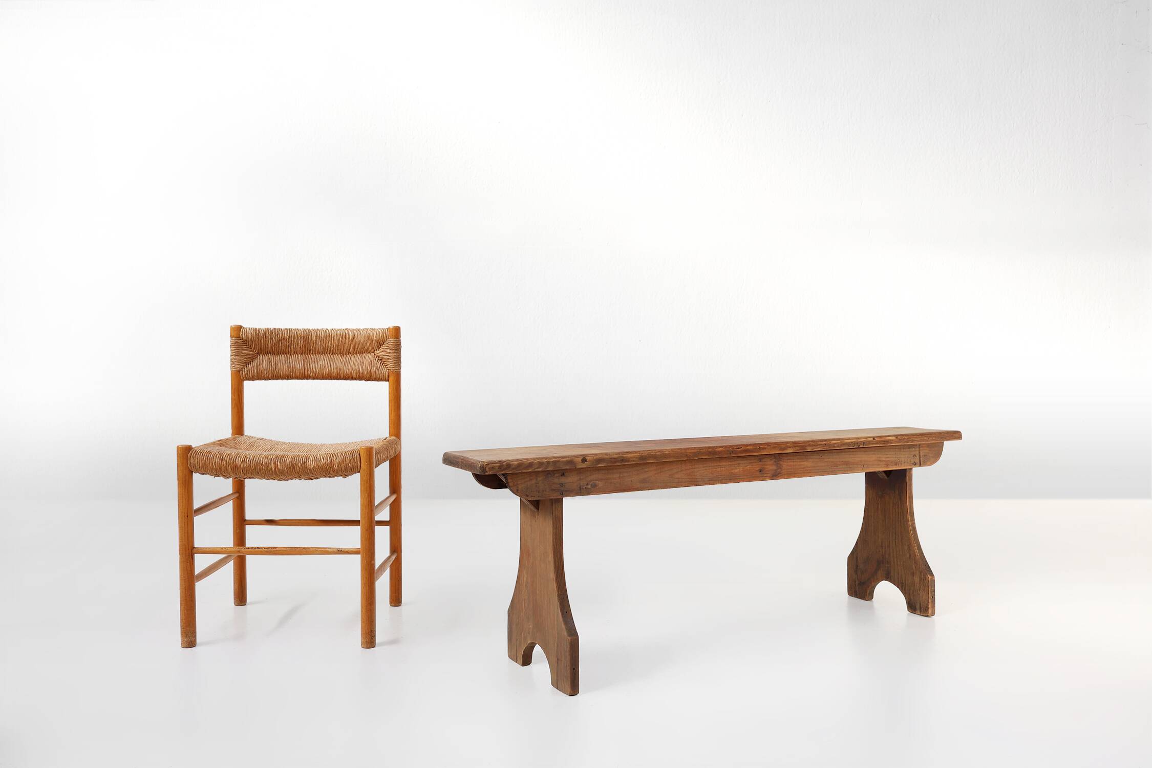 Rustic natural oak wooden bench with rounded details, France ca. 1900