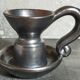 1950s iridescent black ceramic hand candle holder