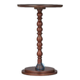 Round wooden tables with carving