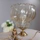 Table lamp with gold metal base, vintage amber globe