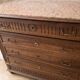Antique wooden commode with marble top and mirror.