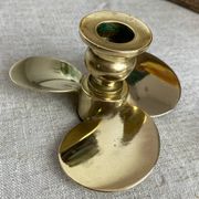 Pair of vintage brass propeller-shaped candlesticks