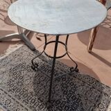 Round wrought iron and zinc bistro table