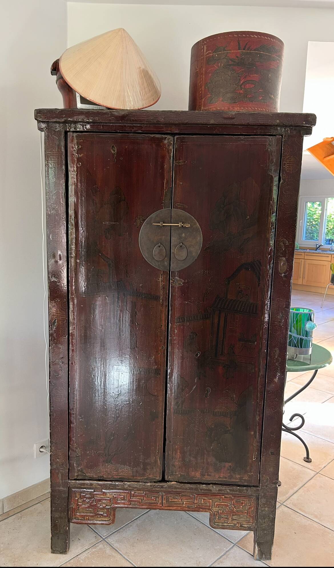 Antique Chinese wardrobe in carved elm.