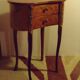 Louis XV style bedside table with varnished marquetry.