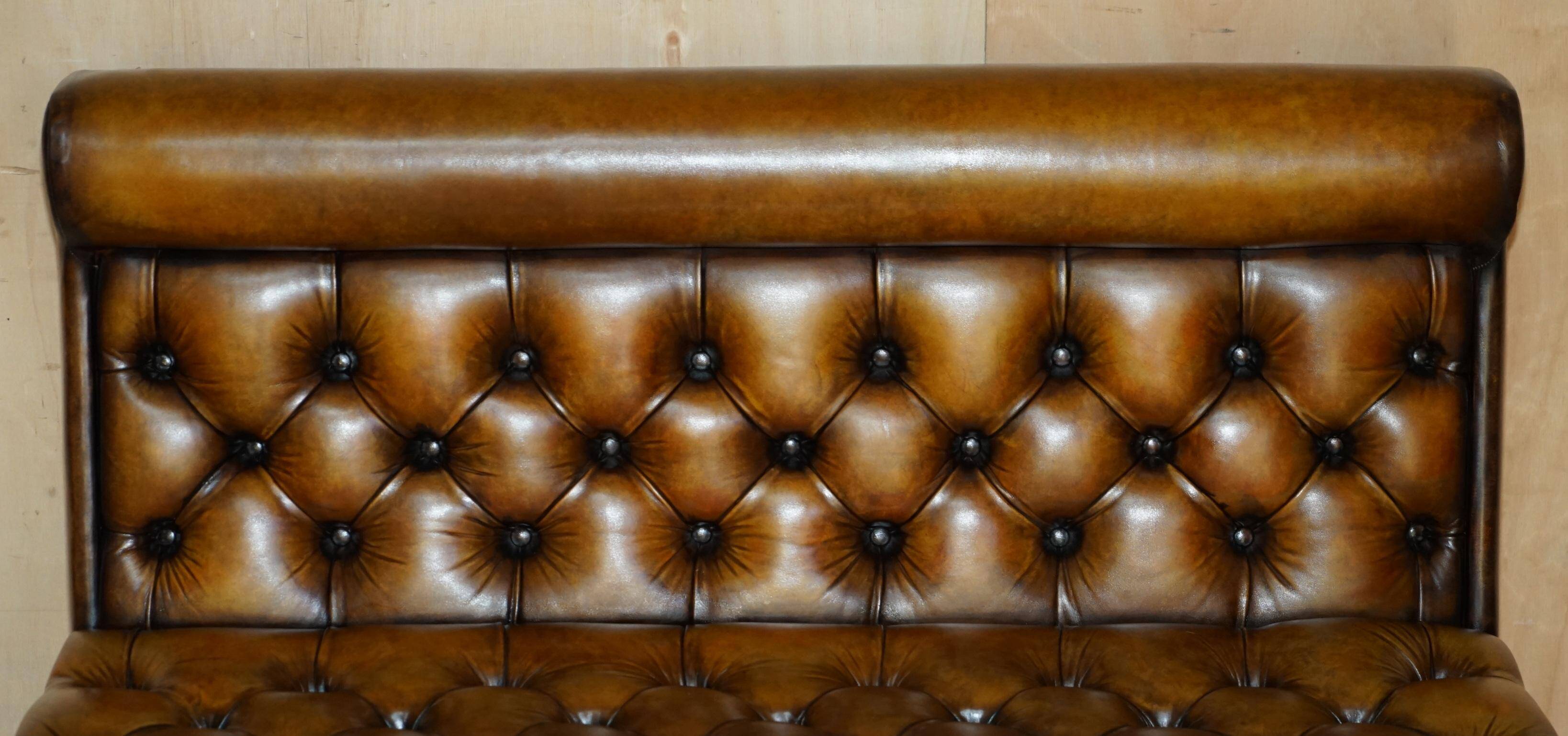 Pair of Victorian Chesterfield pub benches in leather.
