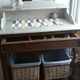 Dressing table in oak wood with a slightly veined white marble top.