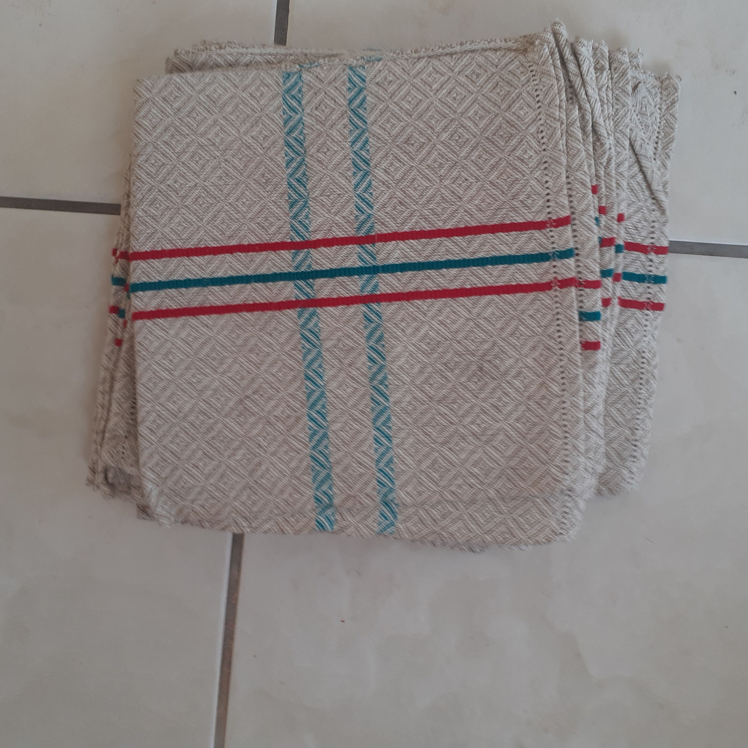 6 napkins. basque style. unbleached background