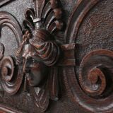 Richly decorated antique fireplace in oak, Belgium ca. 1920