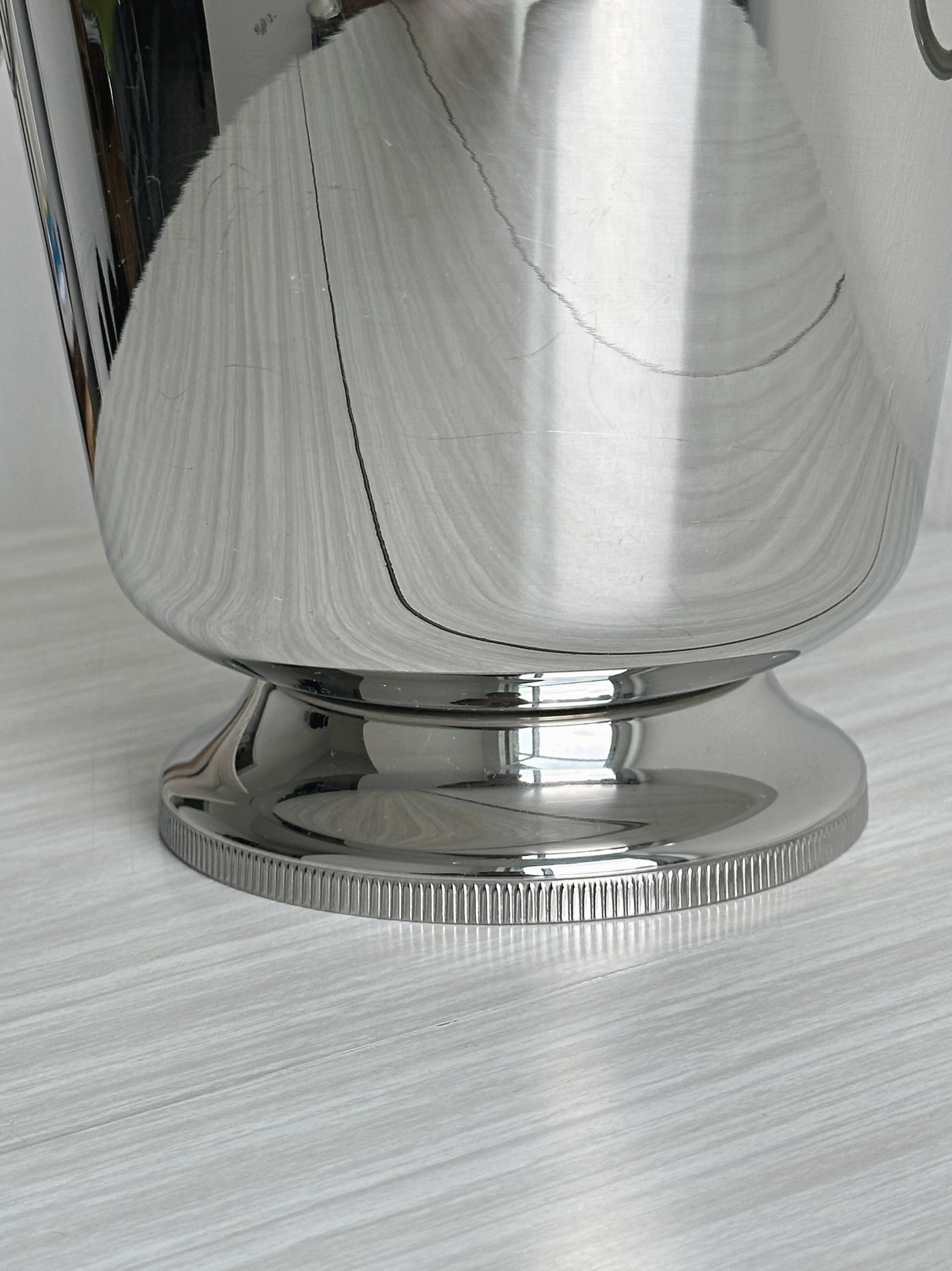 Shiny stainless steel champagne bucket