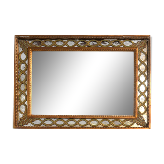 Miroir de style 1940 en bois doré ajouré