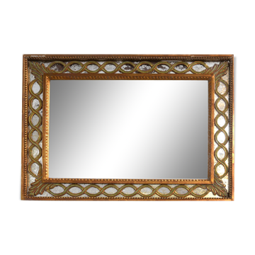 1940 style mirror in open gilded wood
