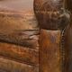Charming and comfortable vintage armchair in grained cowhide leather with character