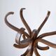 Baumann swivel parrot coat rack, dark wood.