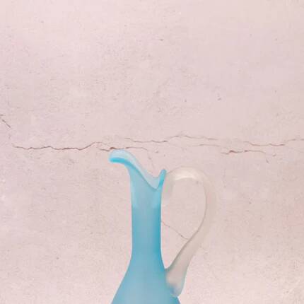 Elegant azure blue blown glass ewer vase