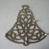 Underside in the shape of an aluminum bell signed WM. A.Rogers kitchen decoration