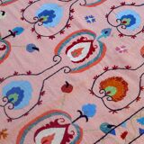 Salmon pink suzani kilim rug with embroidered patterns
