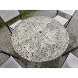 Garden furniture in stone with a vintage 1970s iron base.