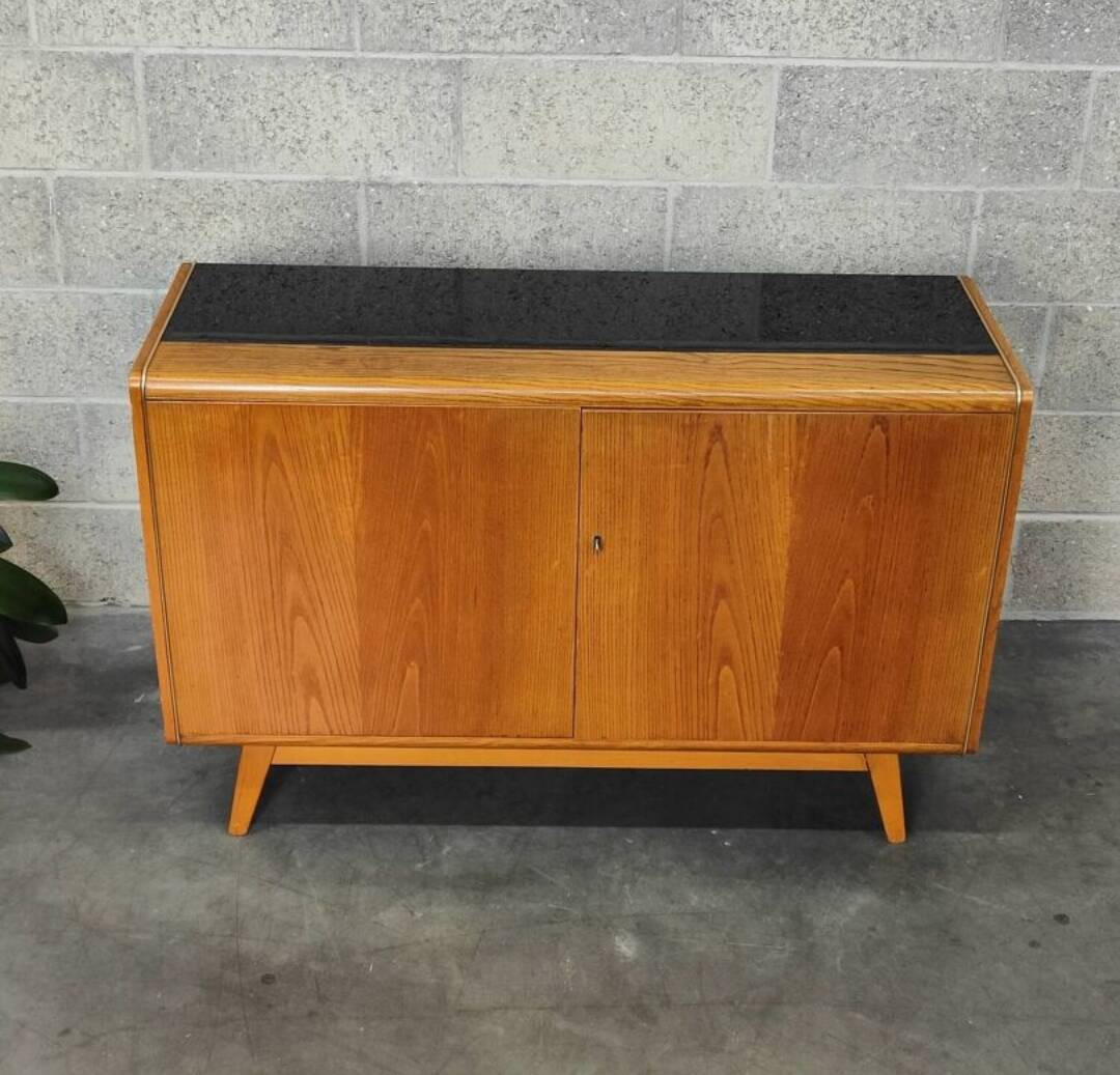 Low wooden sideboard by Bohumil Landsman and Hubert Nepozitek