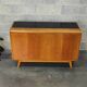 Low wooden sideboard by Bohumil Landsman and Hubert Nepozitek