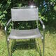 Series of grey and chrome leather armchairs
