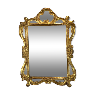 Mirror / mirror in gilded and patinated wood carved with eventful decoration