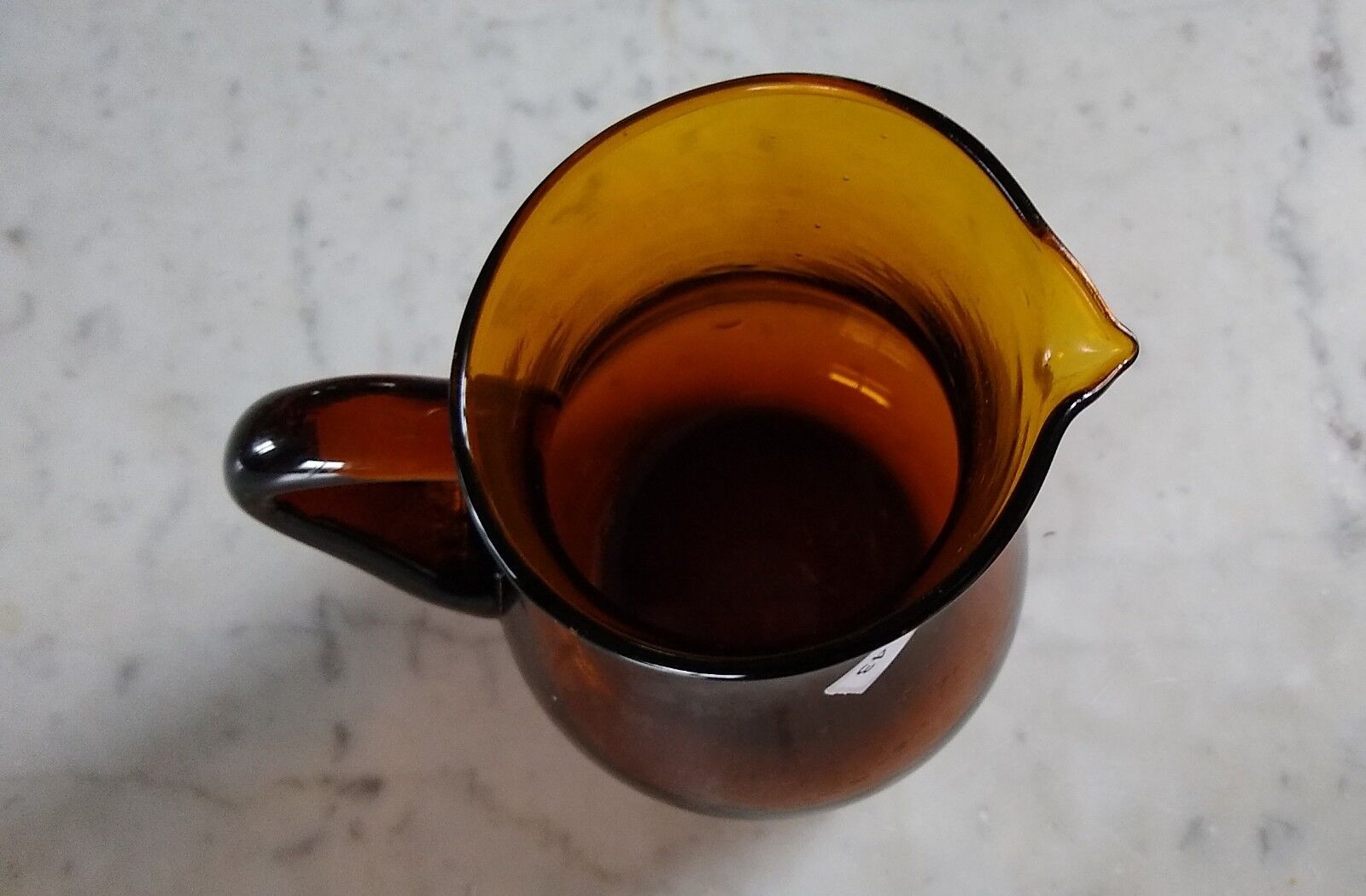 Brown blown glass pitcher