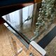 Chrome and smoked glass coffee table on wheels 1970