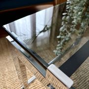 Chrome and smoked glass coffee table on wheels 1970