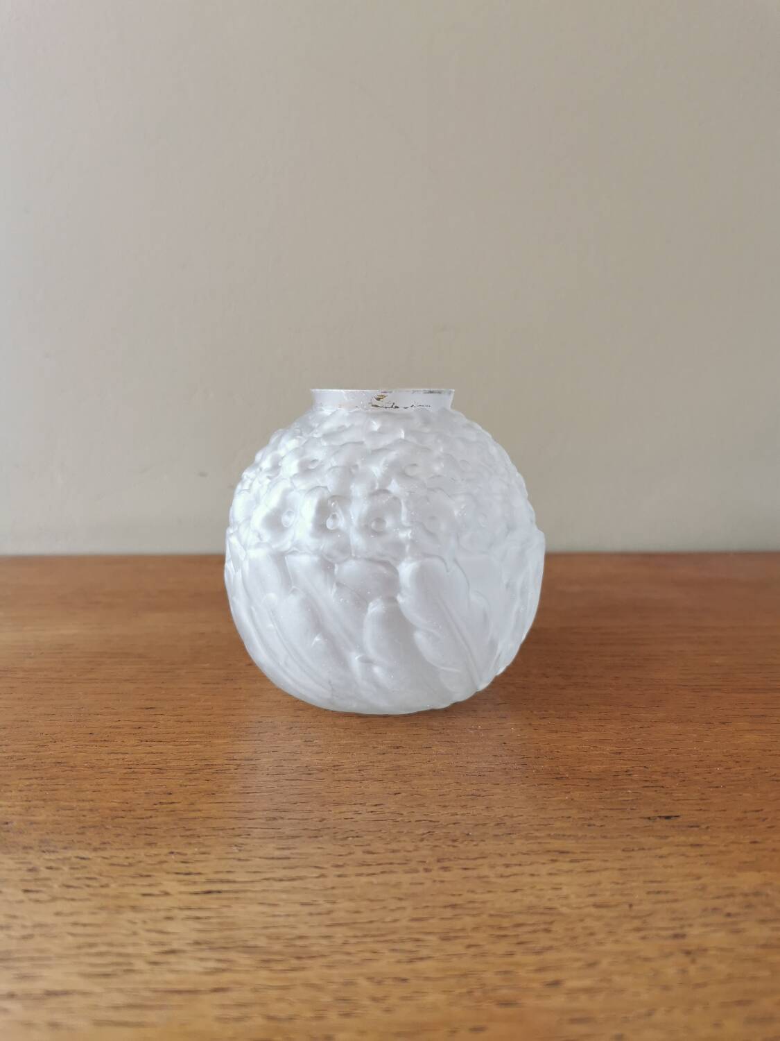 Small art deco ball vase in white glass paste