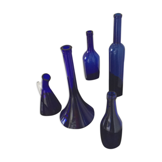 Series of five bottles / jars of cobalt blue apothecary