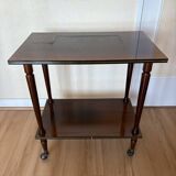 Vintage side table in varnished wood, with casters and gold threads
