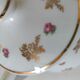 Porcelain teapot Louis Lourioux, decorated with roses and pyroluxe gilding.