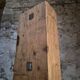 Antique French workshop cabinet in pine with compartments.