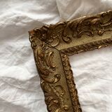 Old frame in gilded wood with stucco decoration circa 1900