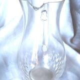 Crystal pitcher engraved with petals