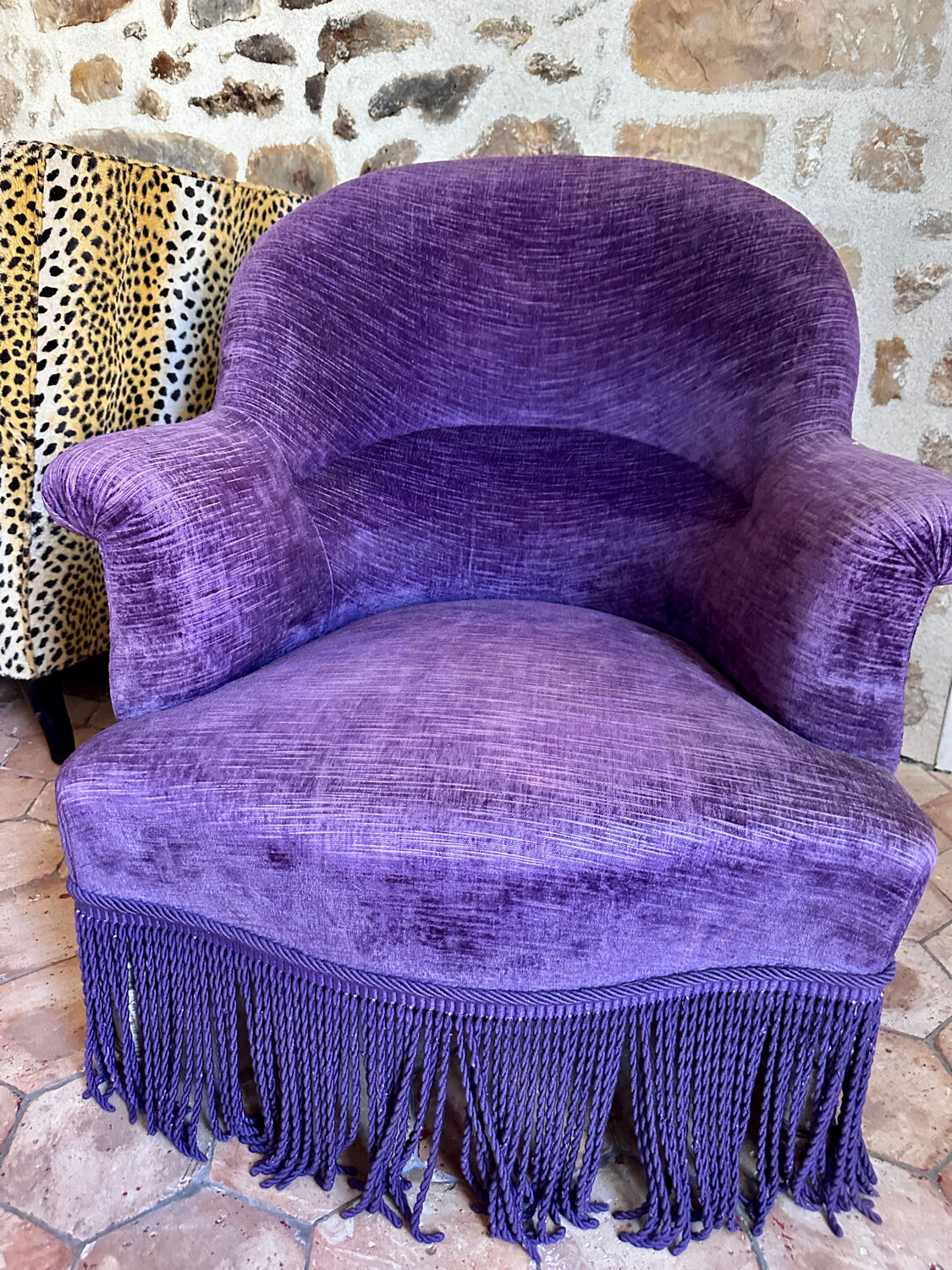 Large armchair, pouffe, purple in velvet.