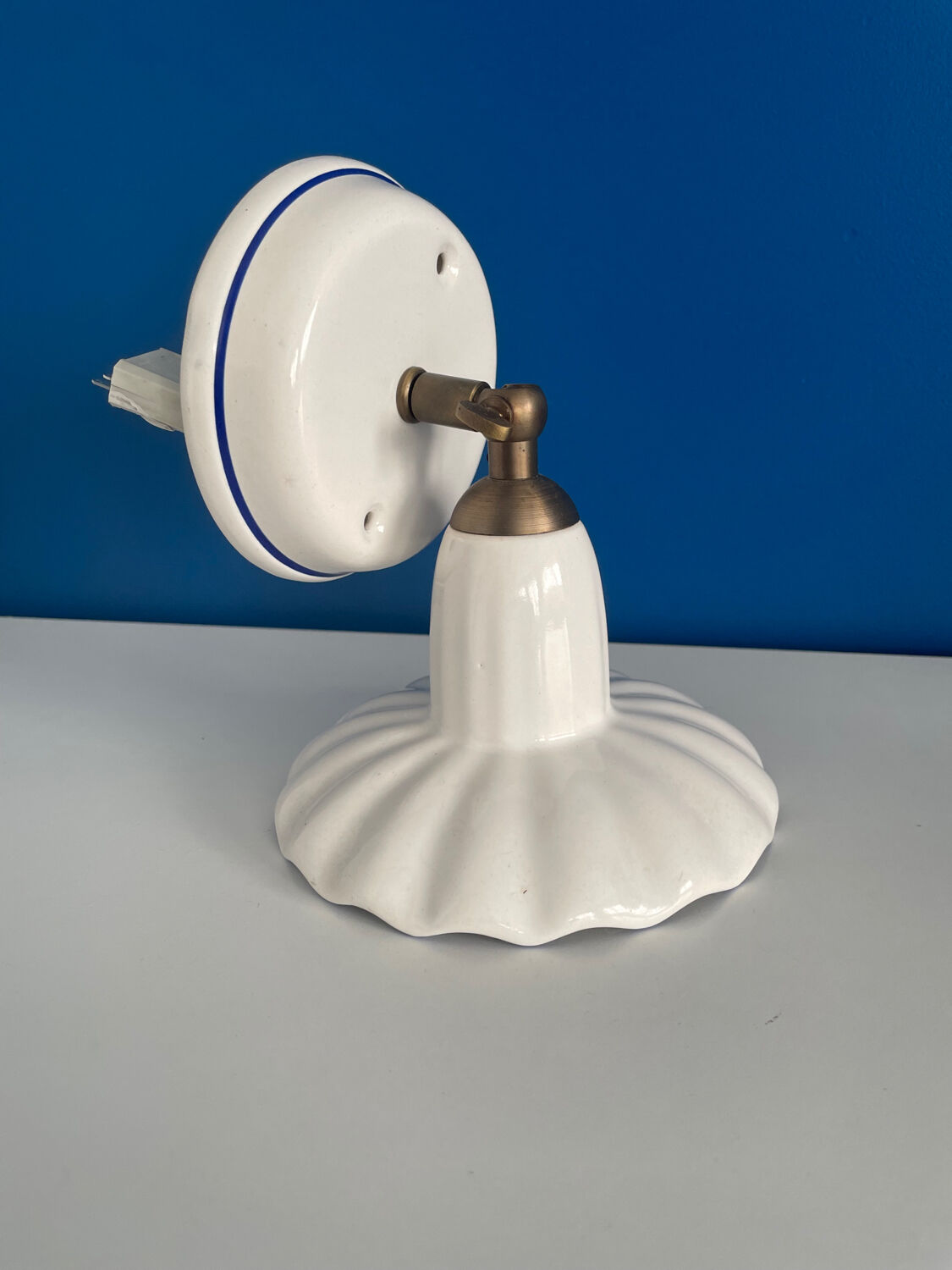 Wall lamp in blue and white porcelain made in italiy