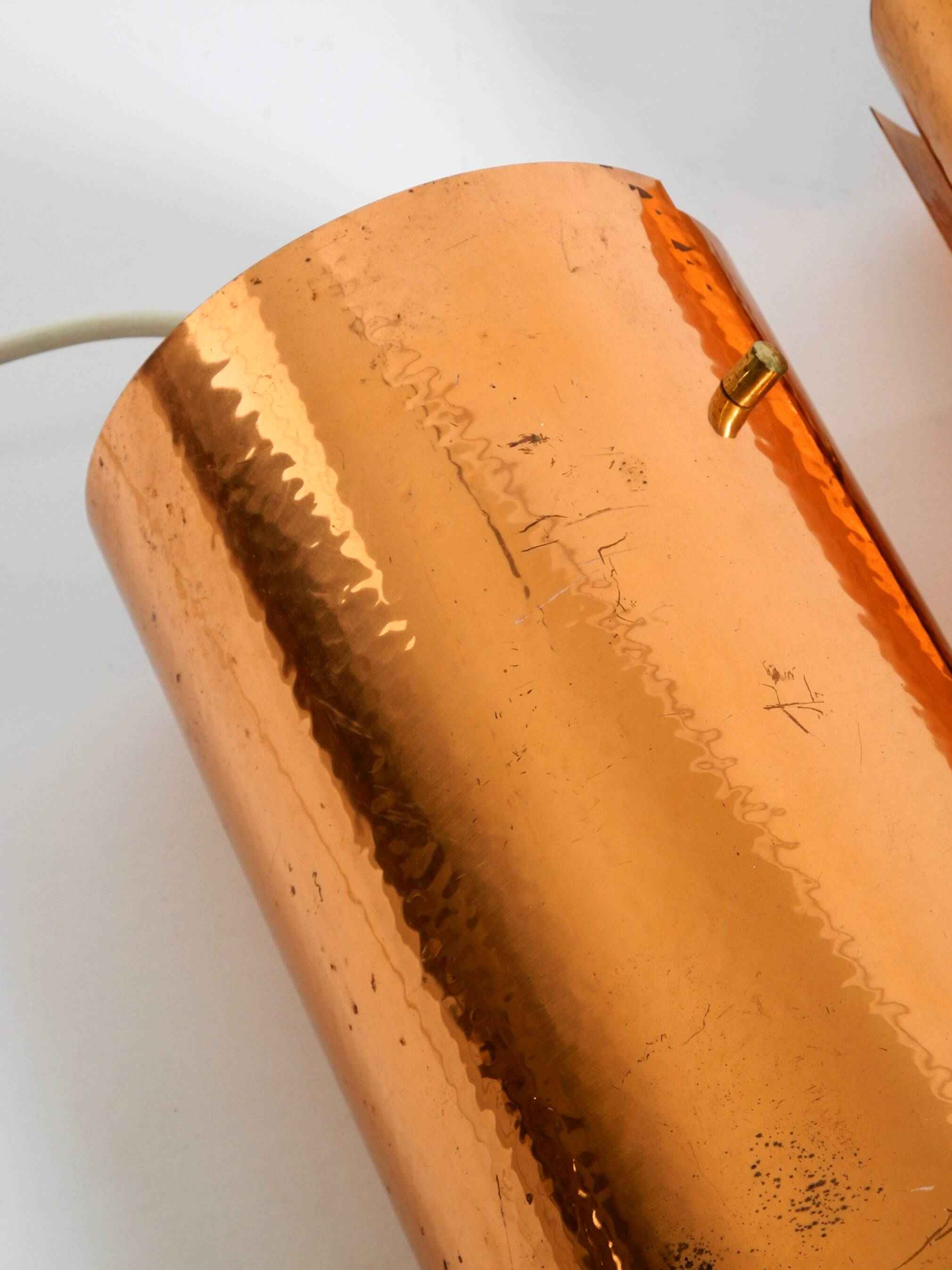 Two 50s tube pendant lamps consisting of two screwed-together copper bowls