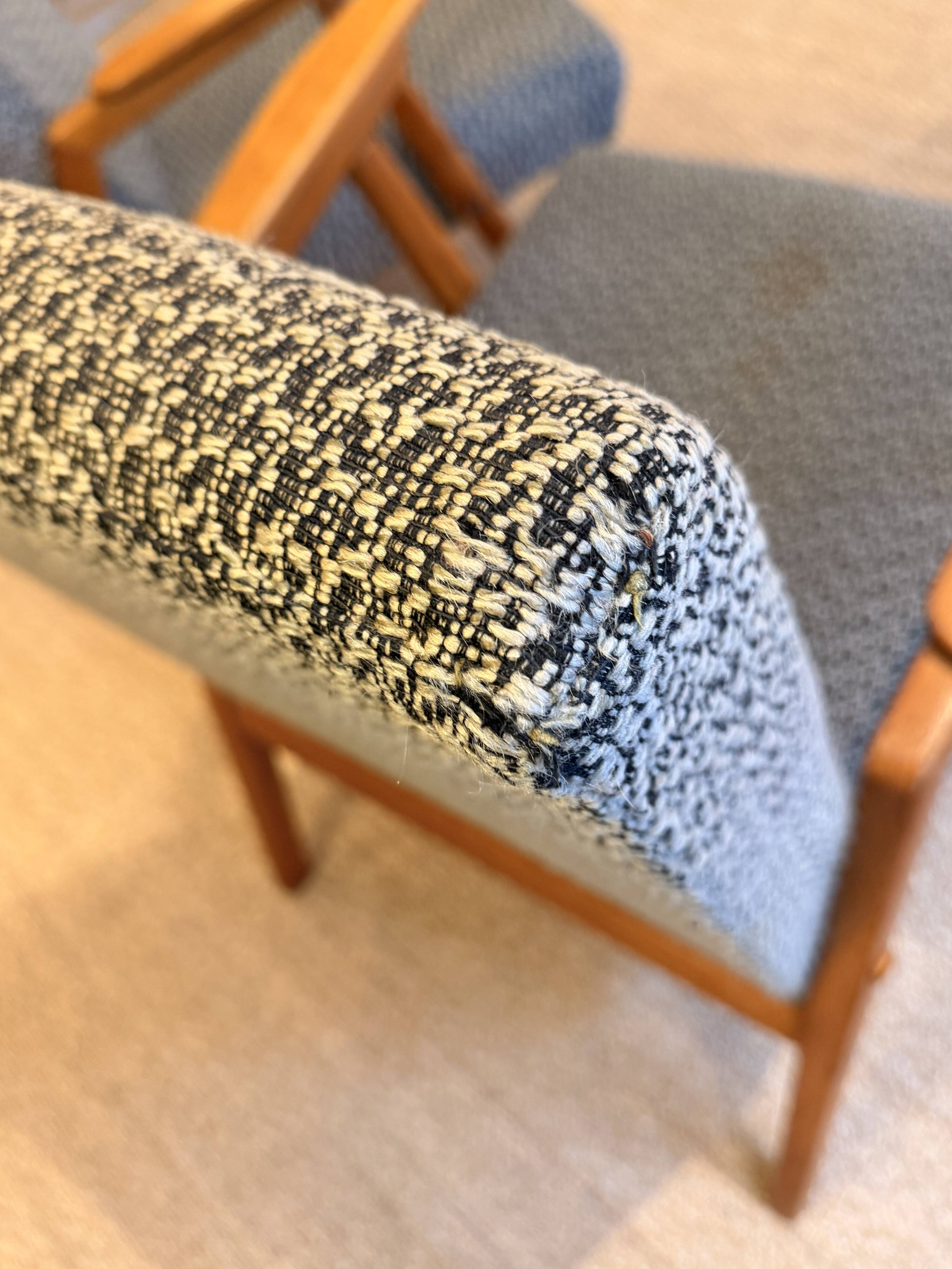 Pair of vintage oak armchairs, original fabric and seat.