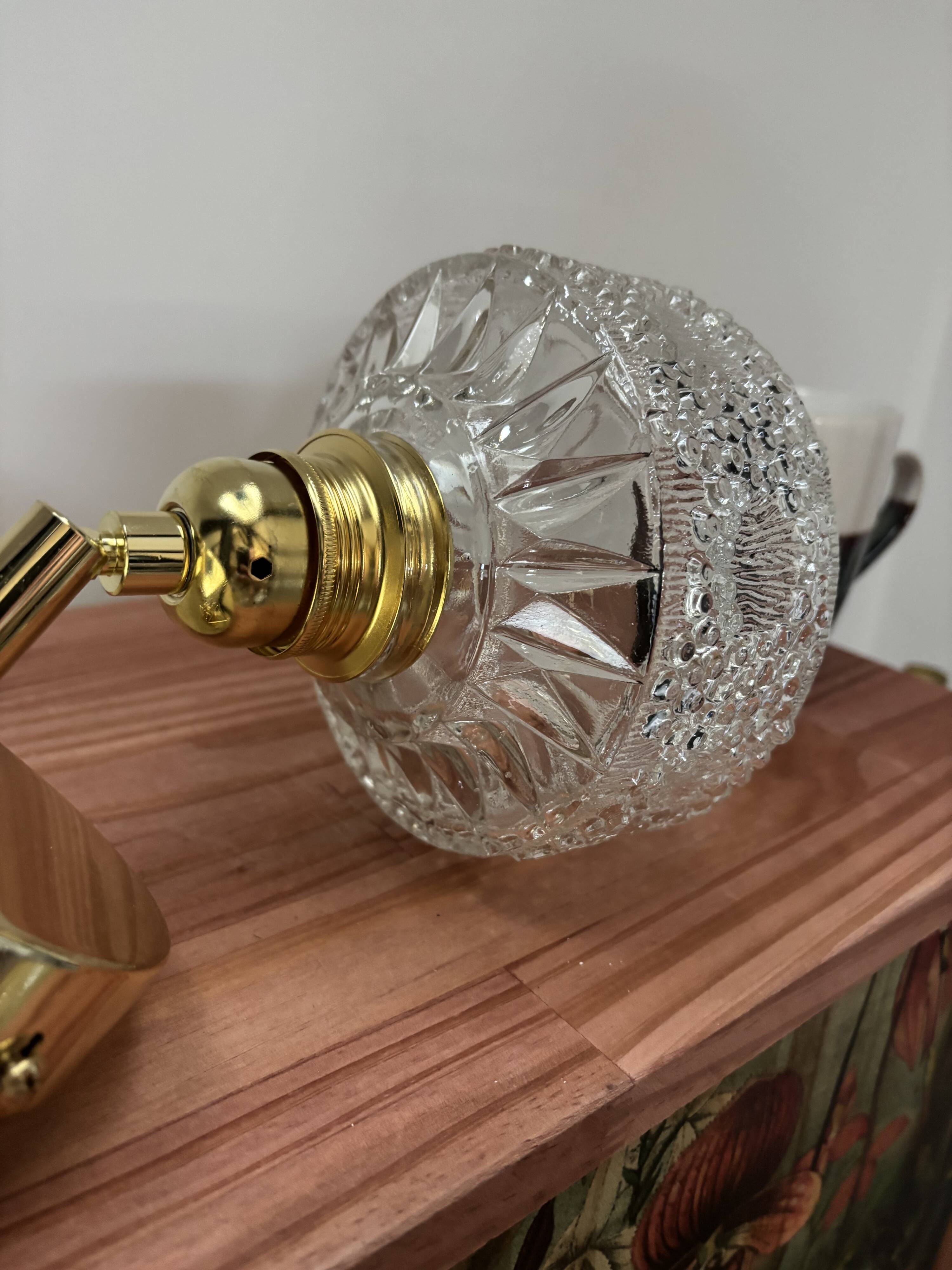 Gold tilting wall light