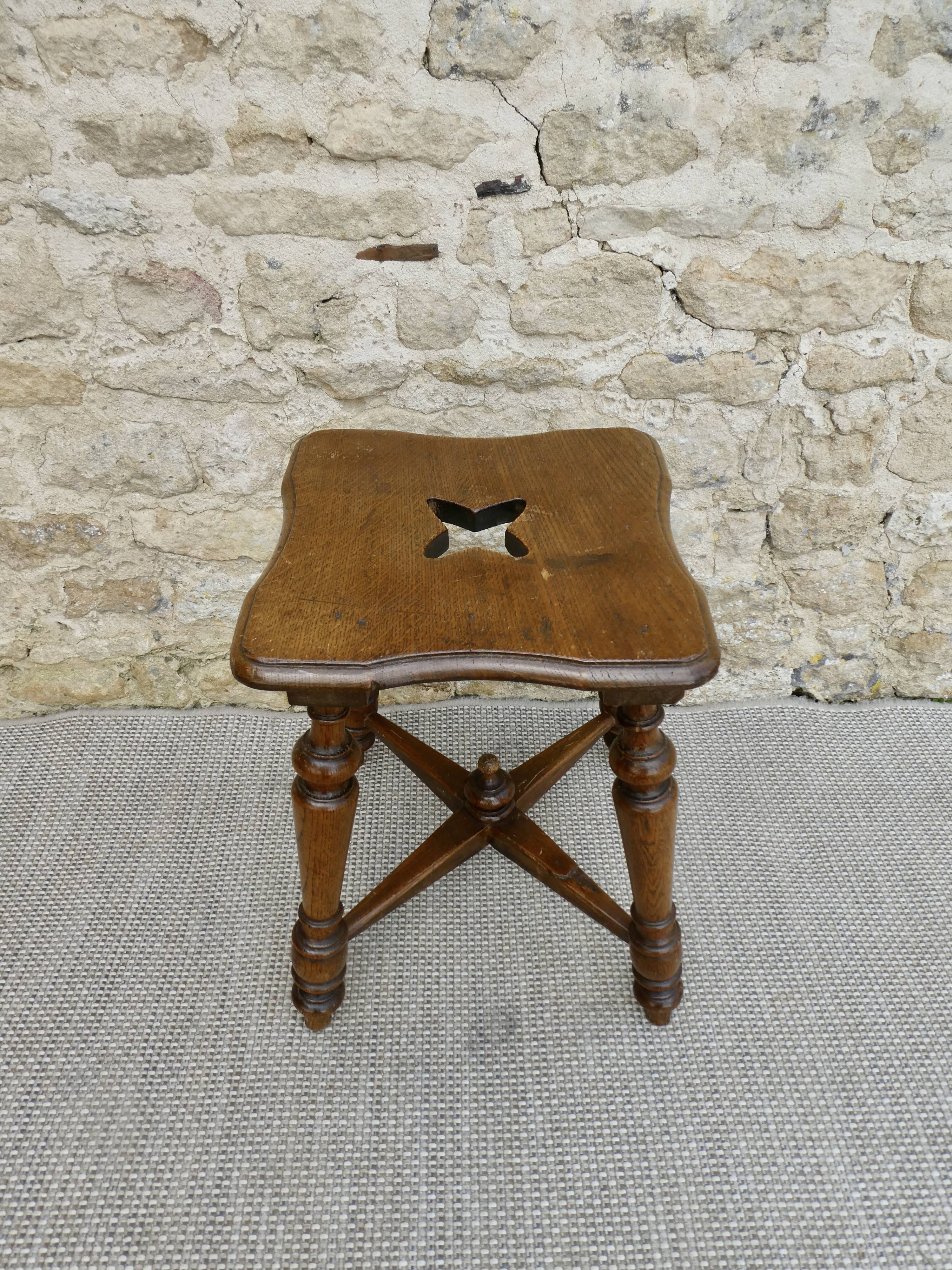 Solid wood and carved stool