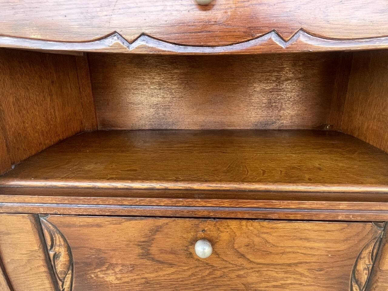 Art Deco bedside table in walnut, black marble top, circa 1920.