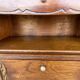 Art Deco bedside table in walnut, black marble top, circa 1920.