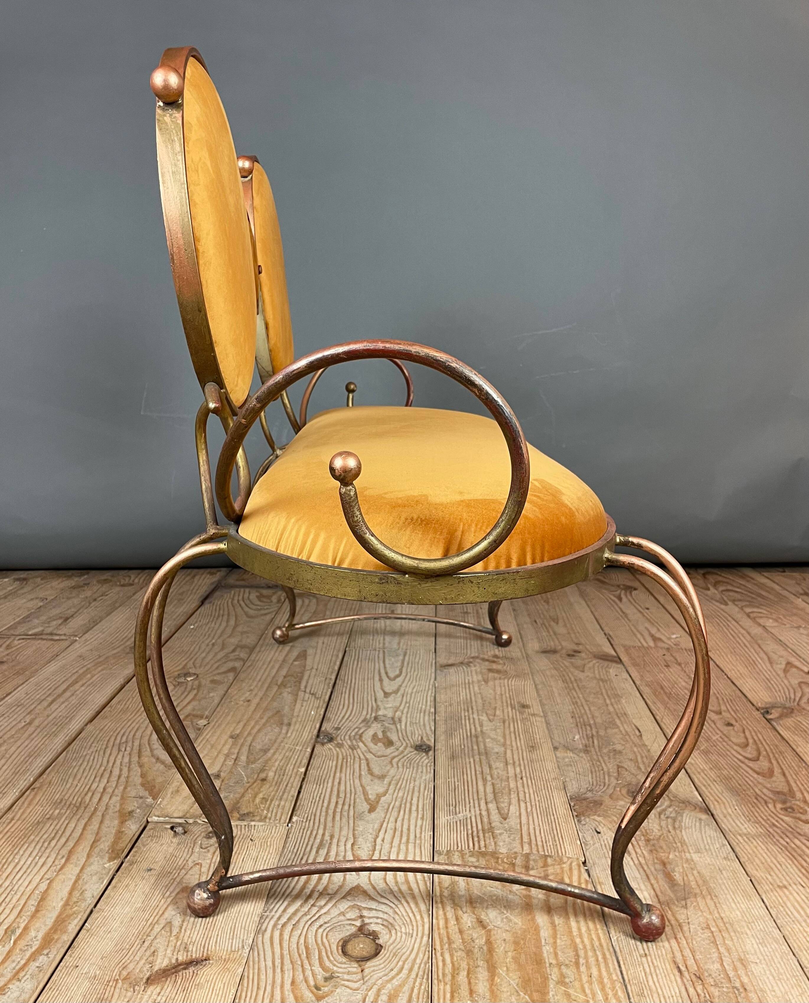 Wrought iron and velvet sofa