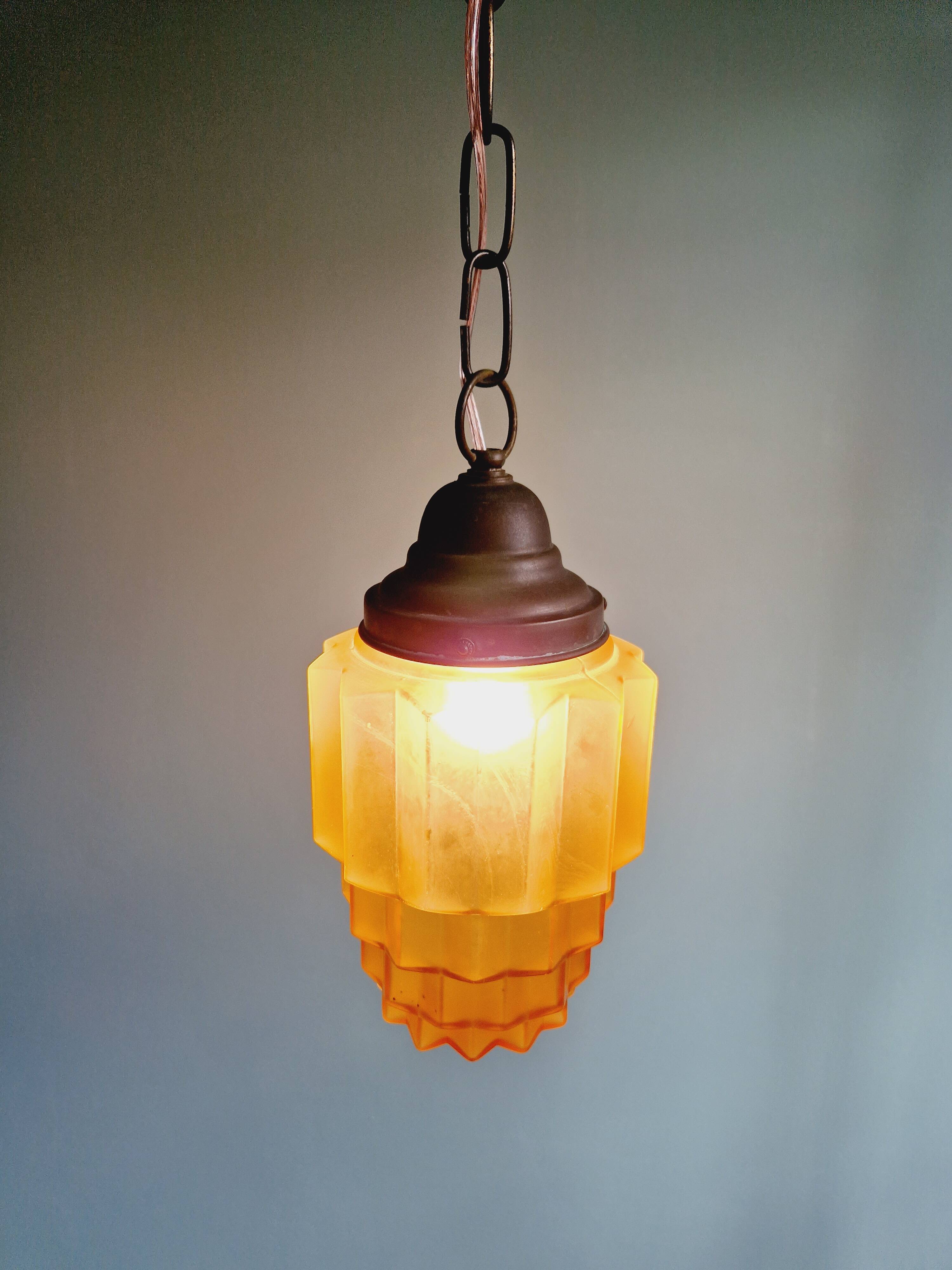 Art Deco Skyscraper type pendant lamp in amber glass, 1920s-30s