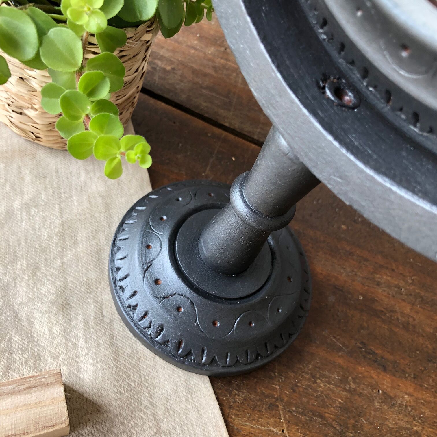 Wooden mirror on foot