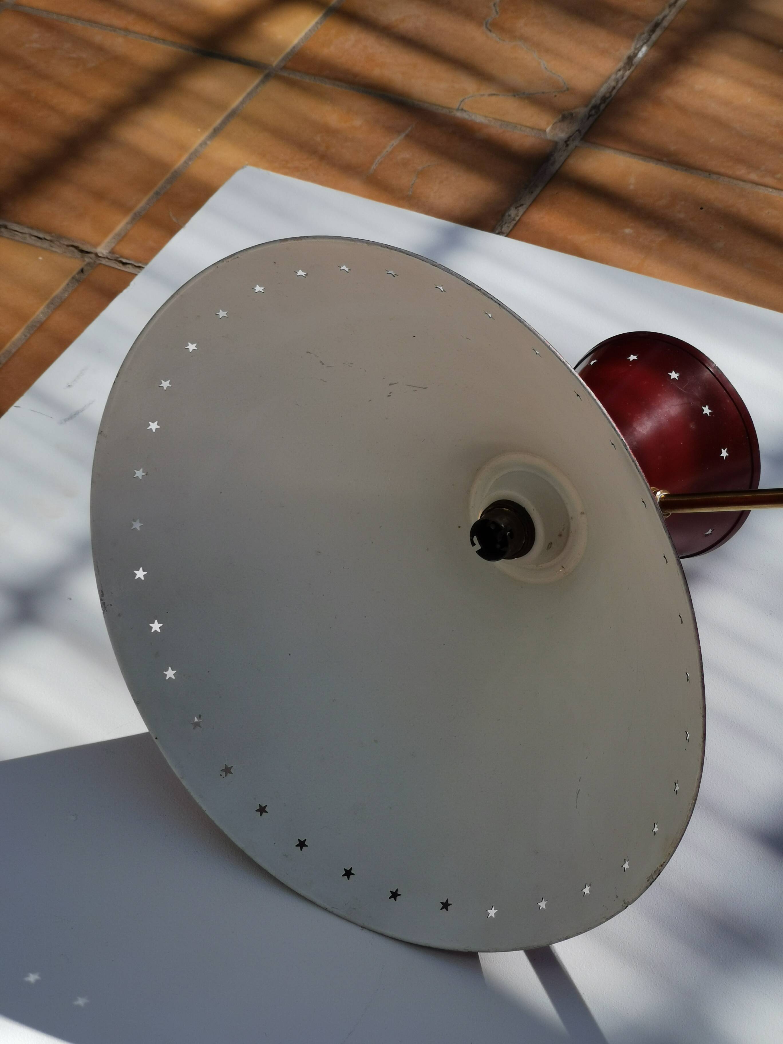 Large Diabolo wall lamp René Mathieu for Lunel burgundy color