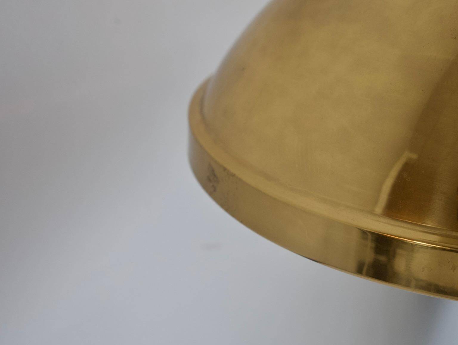 Bergboms ceiling light in brass with acrylic shade.